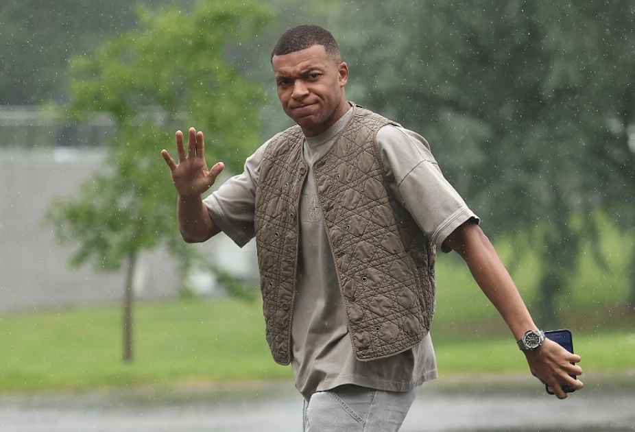 France's forward Kylian Mbappe arrives to the national team's training camp for the upcoming UEFA Euro 2024 European Football Championship, in Clairefontaine-en-Yvelines on May 29, 2024.