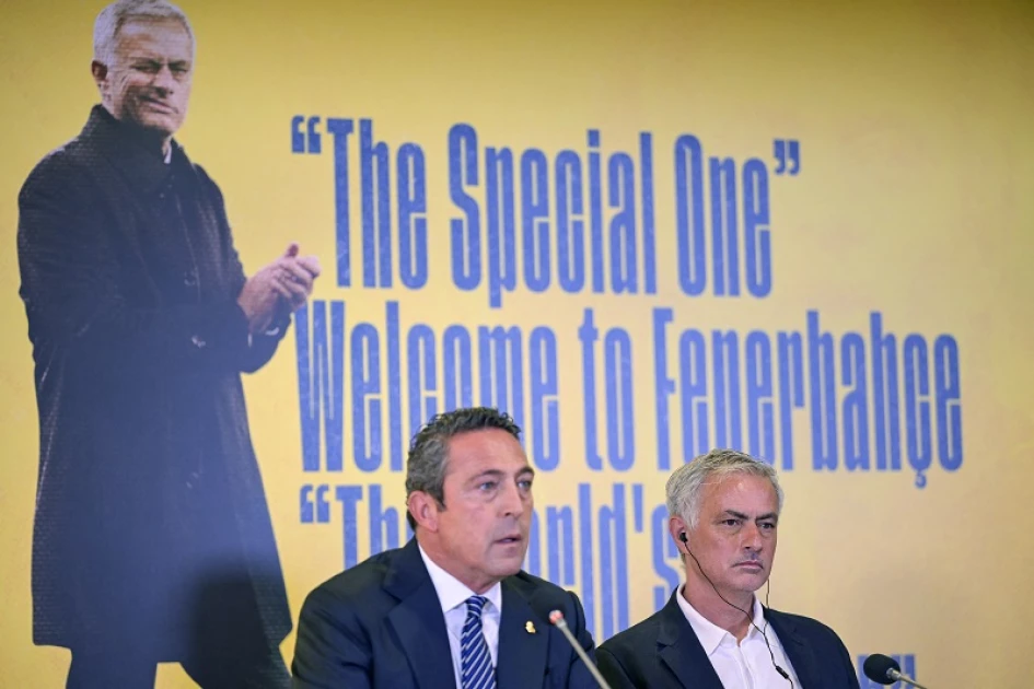 President of Turkish Fenerbahçe Sports Club Ali Koc (L) and new coach of Fenerbahce football team, Portugese Jose Mourinho attend a press conference at the Sukru Saracoglu Stadium in Istanbul on June 3, 2024.